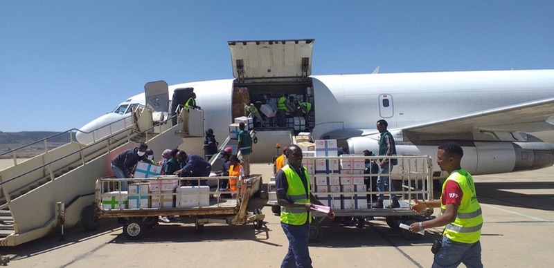 Humanitarian supplies being unloaded from a cargo aircraft